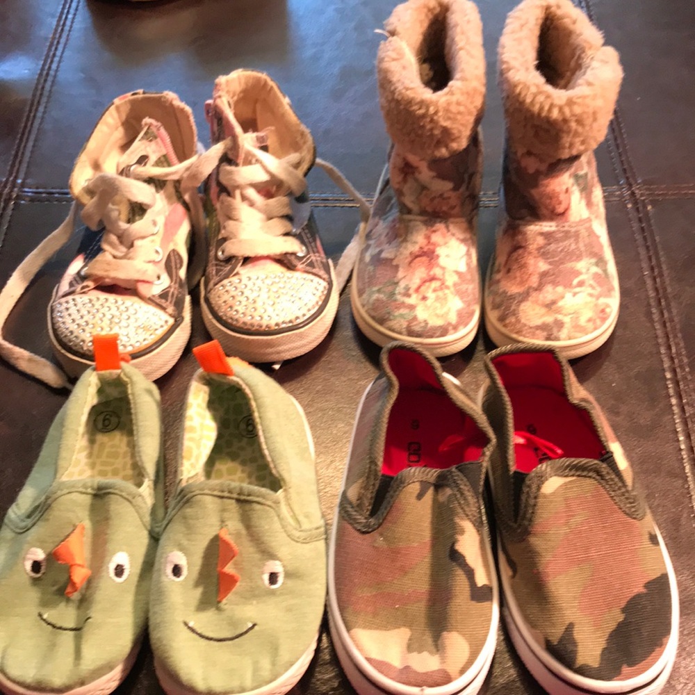 Four pairs of girls size 6 toddler shoes.